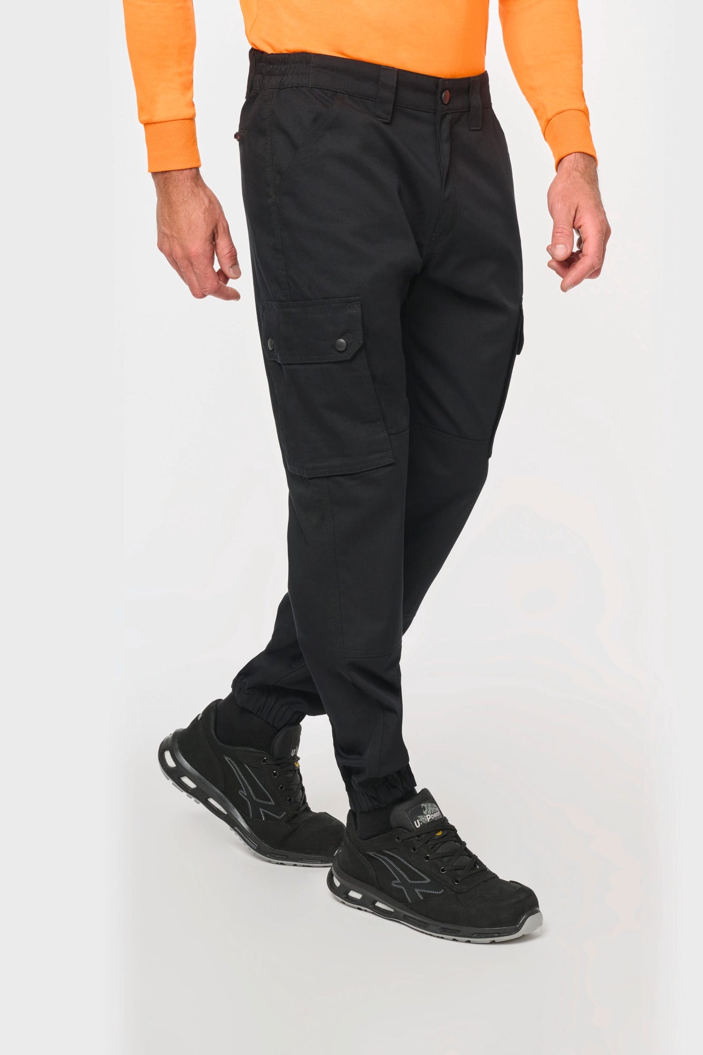 Pantalón tipo cargo unisex con bajo elástico
