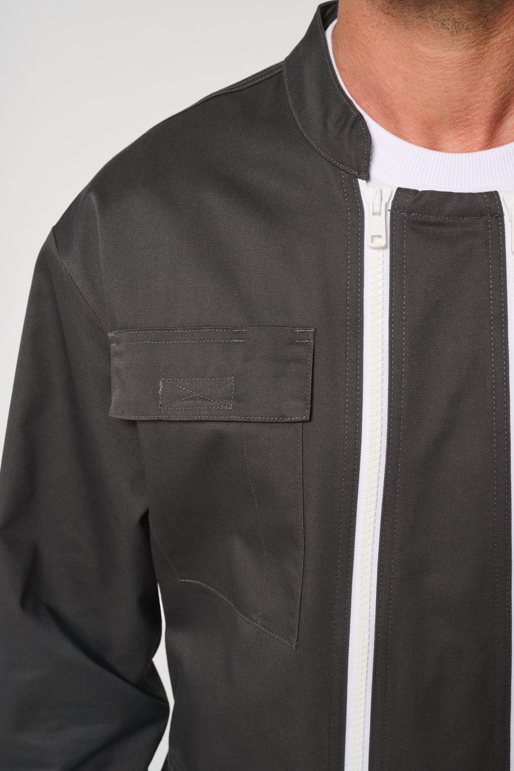 Mono con doble cremallera unisex